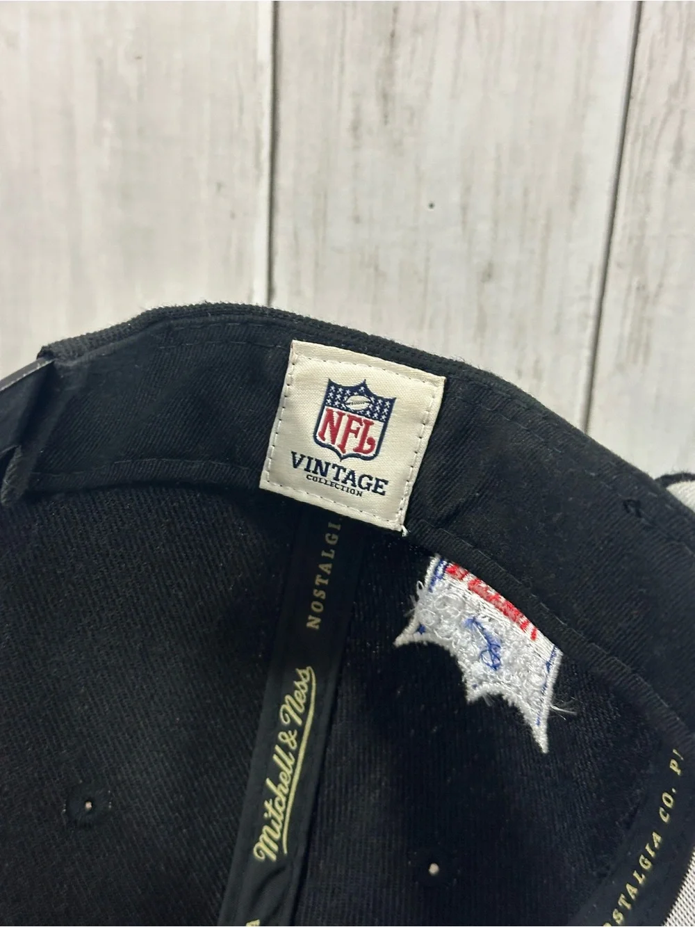 Mitchell & Ness NFL Los Angeles Raiders Script Snapback Men’s Hat